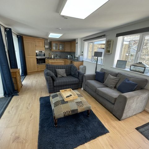 Open Plan Living Space with Sofa Bed